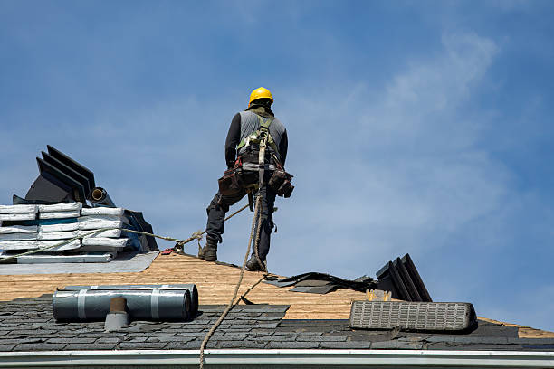 Professional Roof Replacement technician working in Kenmare, ND